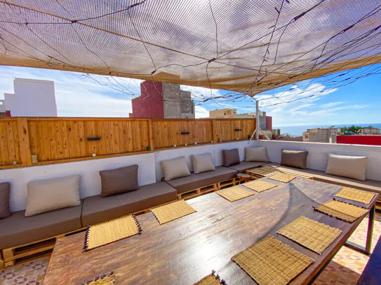 Rooftop terrace lounge at Endless Wave surf camp in Tamraght