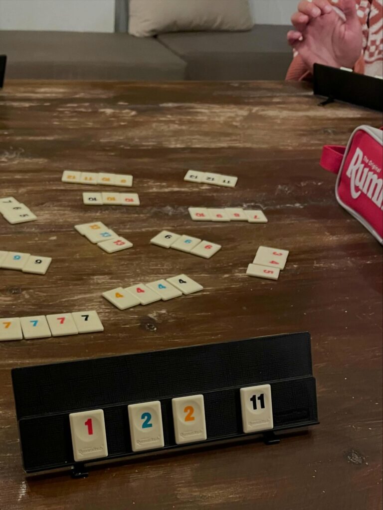 Card games on the table during a relaxed evening at the surf camp