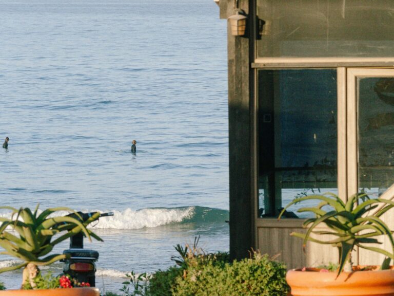 Ocean view in Taghazout with surfers in the distance